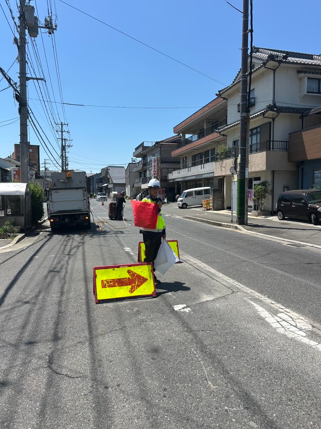片側交互通行規制の交通誘導現場